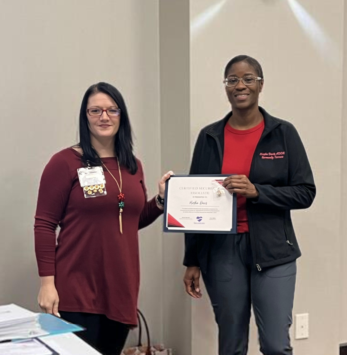 Miesha Davis receives her Associate and Care Partner level certifications, making her the first facility level employee to do so.