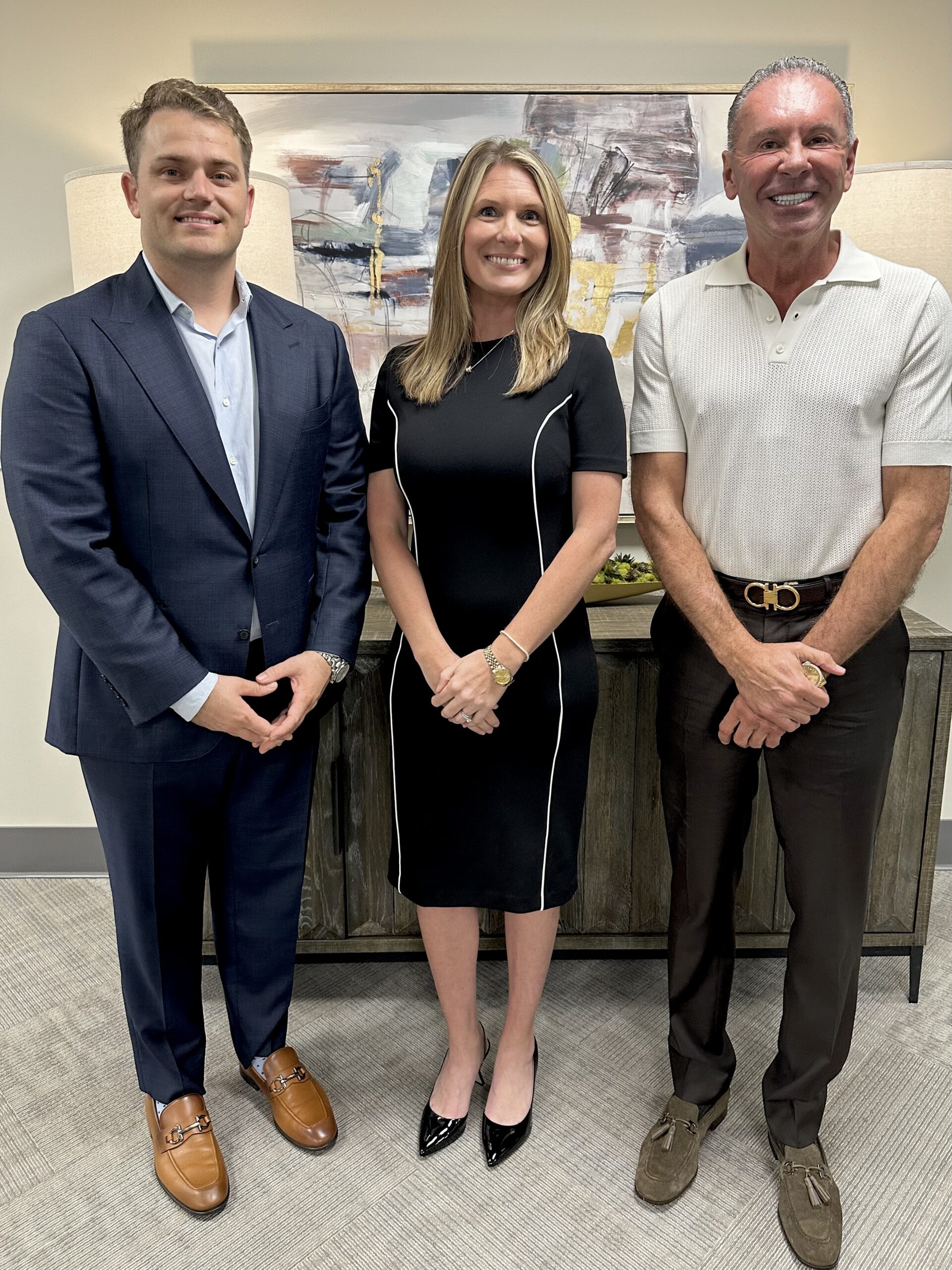 Promotion of Chelsea Jordan Chelsea Jordan standing with Gary Blake, President and CEO, and Auston Clanton, COO